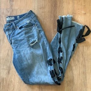 Distressed Jeans With Black Ribbon